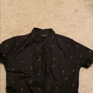 Short sleeve button up shirt.